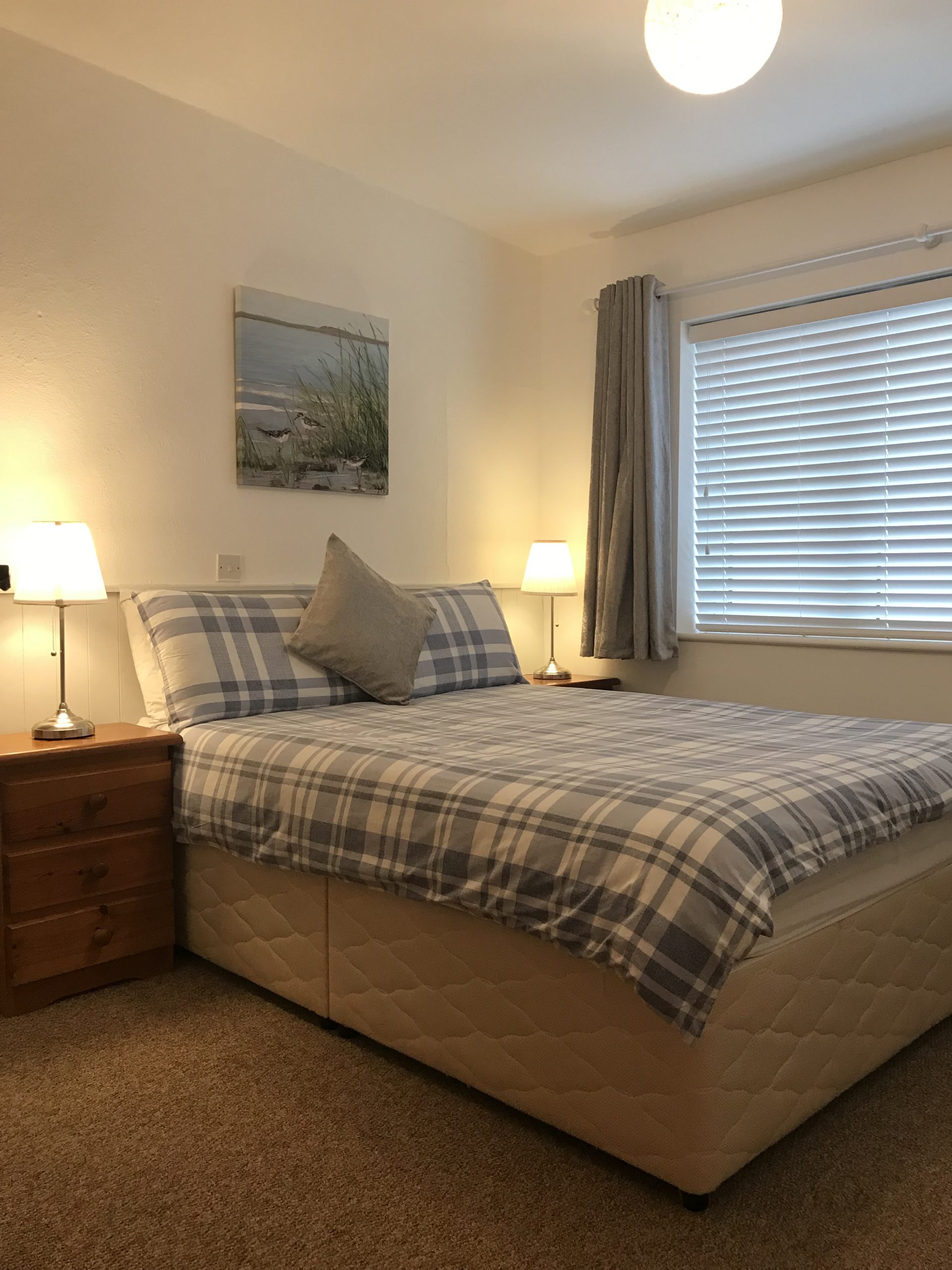 Beachcomber Haven: A comfortable bedroom for restful nights